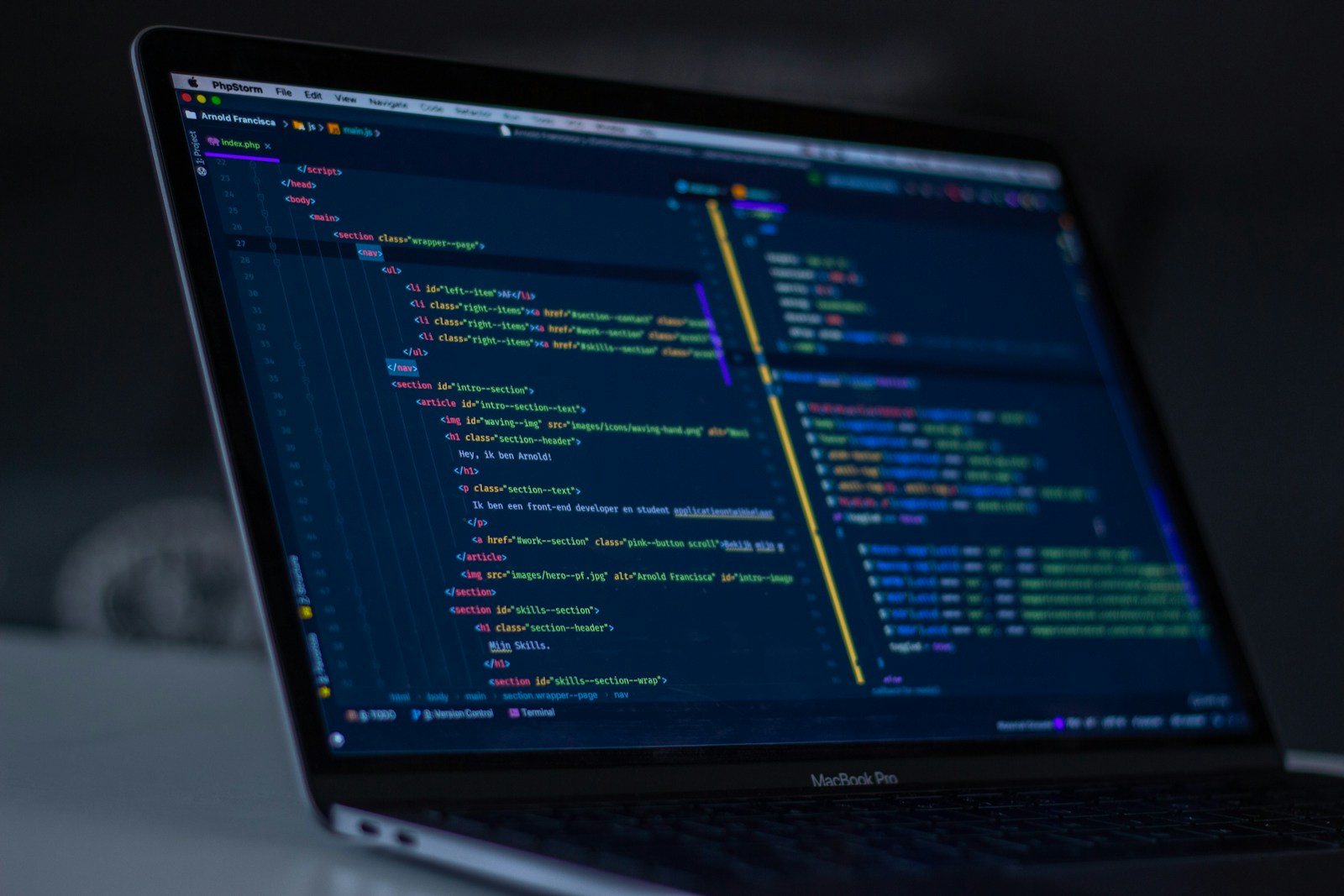 Consultant reviewing API and data migration results on a laptop